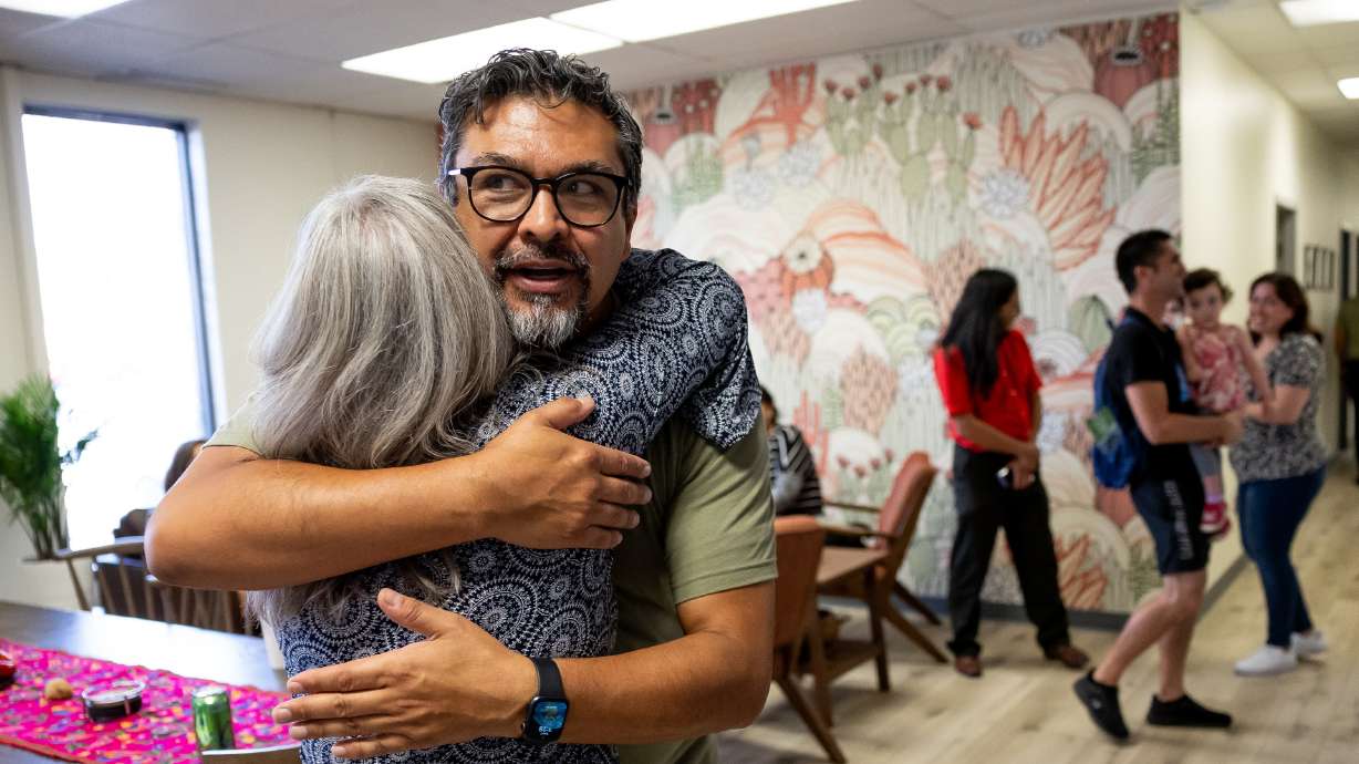 Javier hugging to celebrate new location