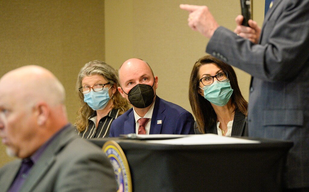 Governor Spencer Cox attends a press conference.