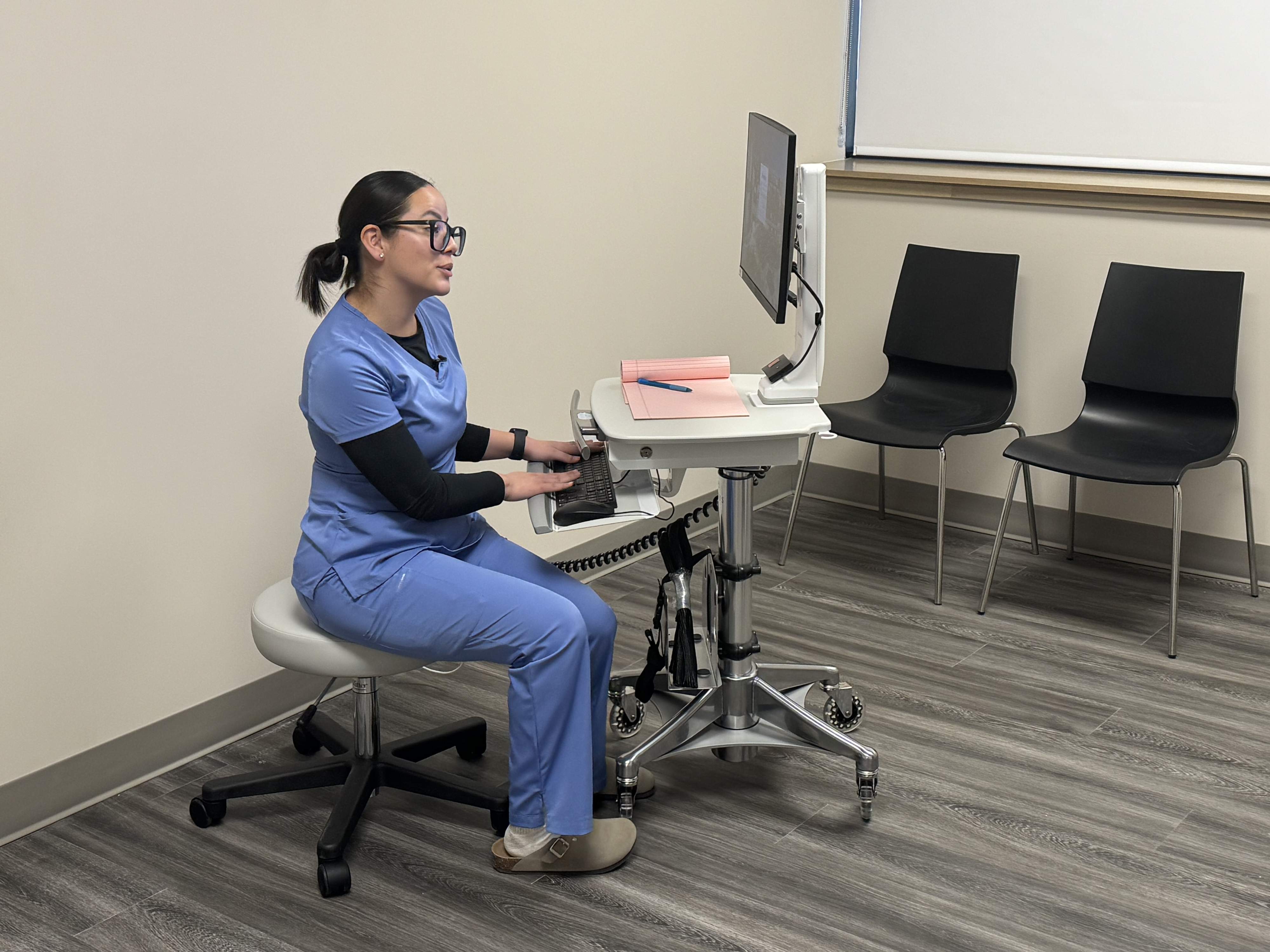 Jasmine gaining hands-on experience with patient care