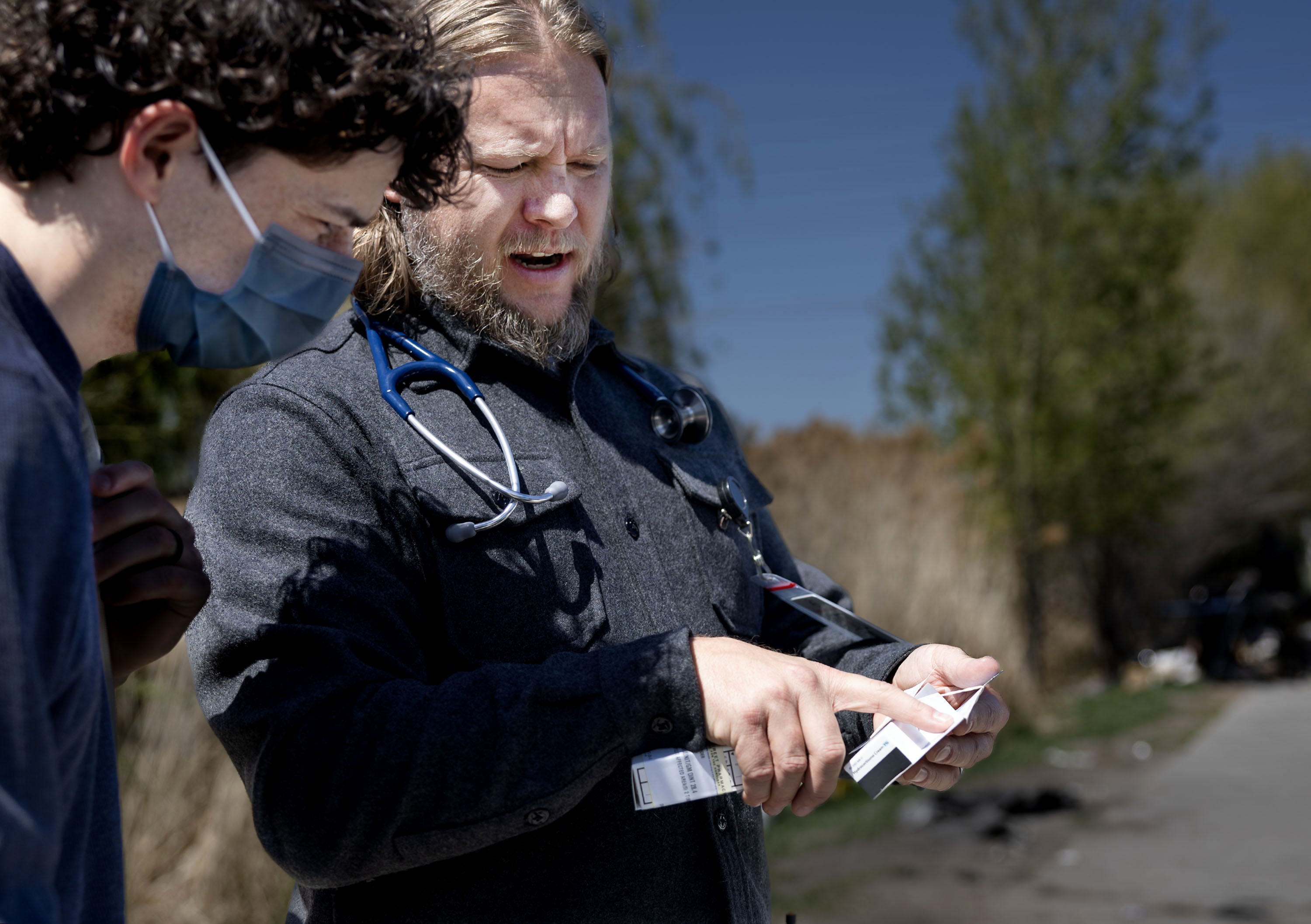 Michael instructs a student, explaining the medication and asking questions about why he'll be prescribing it.
