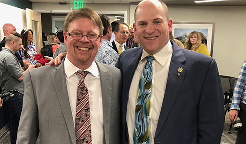 A picture of (left to right) University of Utah Health IT manager John DeGrey and Utah Senator Daniel Thatcher