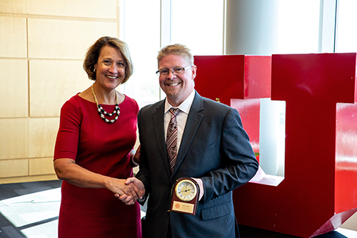 A picture of University of Utah president Ruth V. Watkins and IT manager John DeGrey