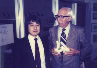 In conjunction with Wilem Kolff, right, Sung Wan Kim helped develop the first artificial heart.