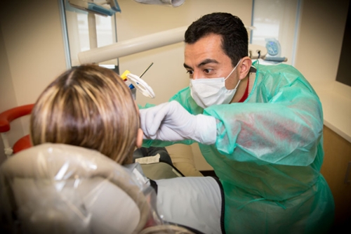 UofU School of Dentistry student and patient