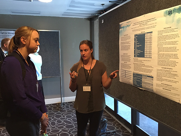 Elizabeth Nagelhout explains her research on colorectal cancer screening at the Utah Cancer Action Network conference in May, 2016.