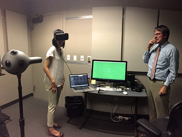 Dr. Wu tries out virtual reality technology during an August 2016 trip to Wu team collaborator Jake Jensen's lab, a CCPS Investigator and faculty member at the University of Utah's Communication department.