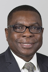 okuyemi-kola-headshot.jpg