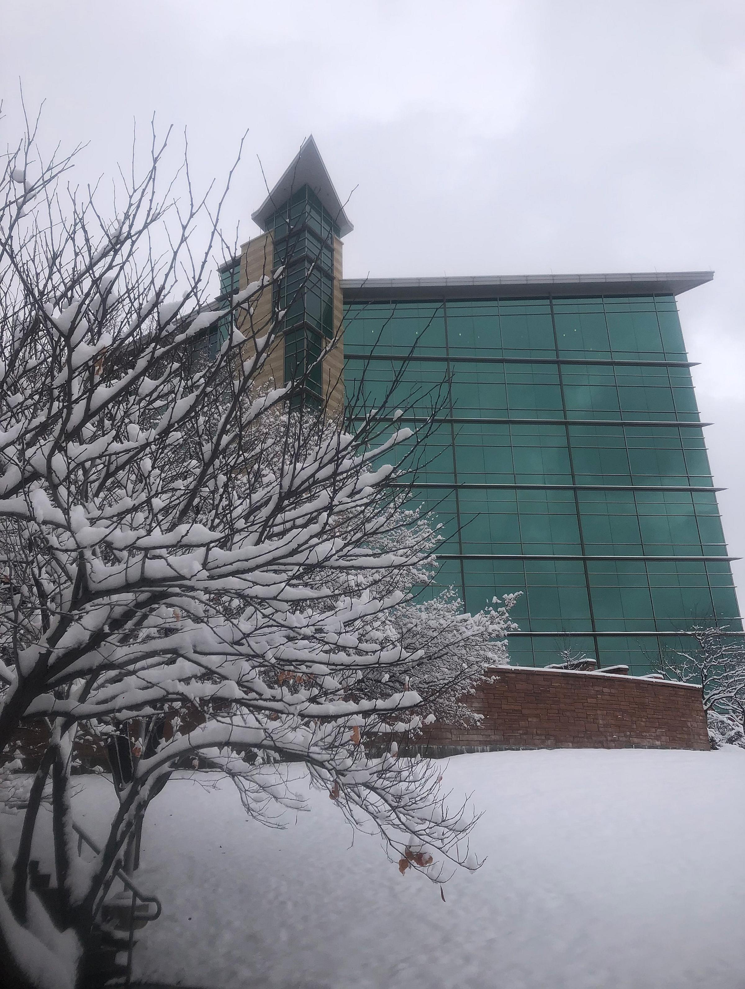 Huntsman Cancer Institute building covered in snow