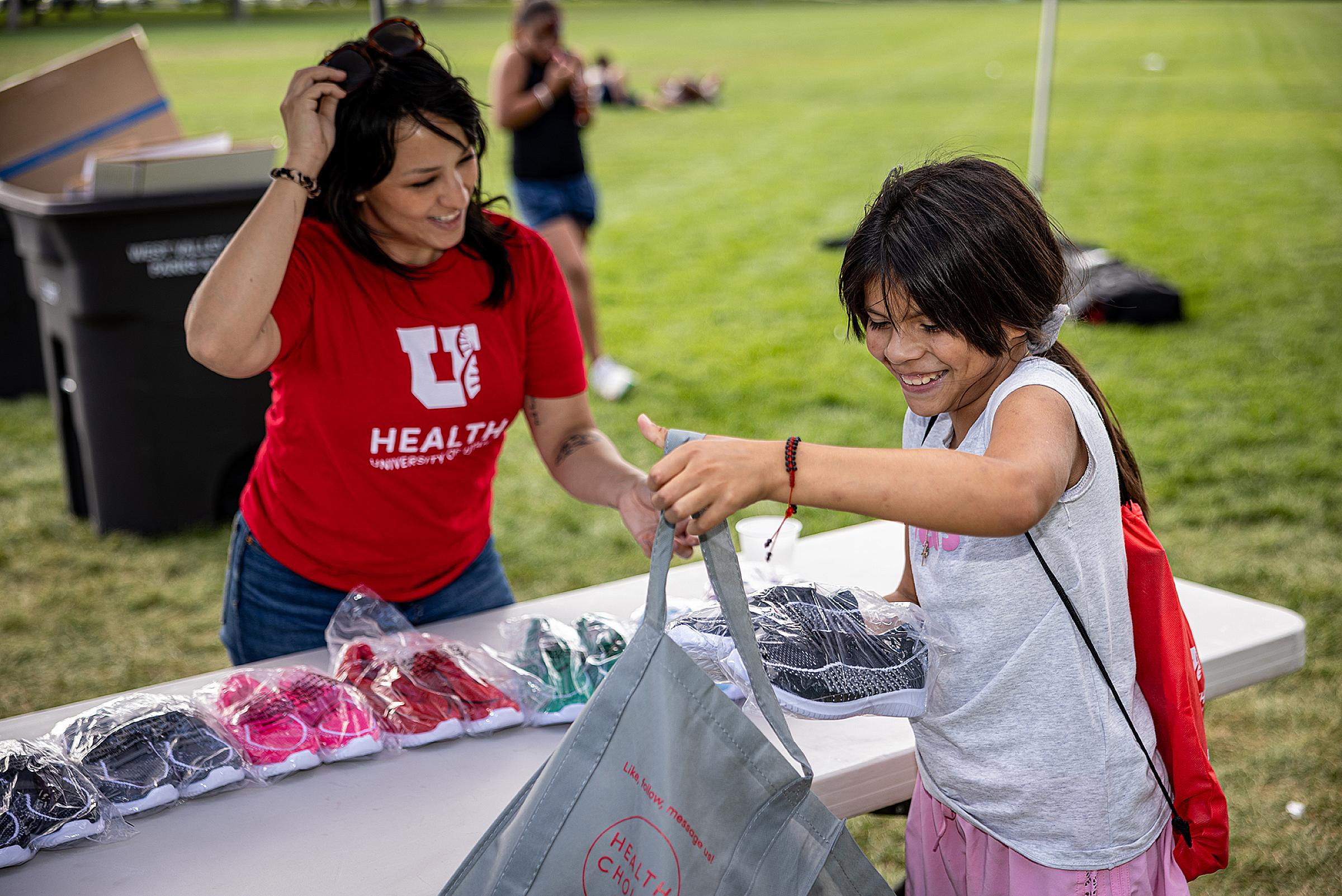 More than 150 pairs of shoes were distributed during Healthy Start West Valley 2024. This annual event hosted by U of U Health aims to connect West Valley residents with critical health screenings and information.