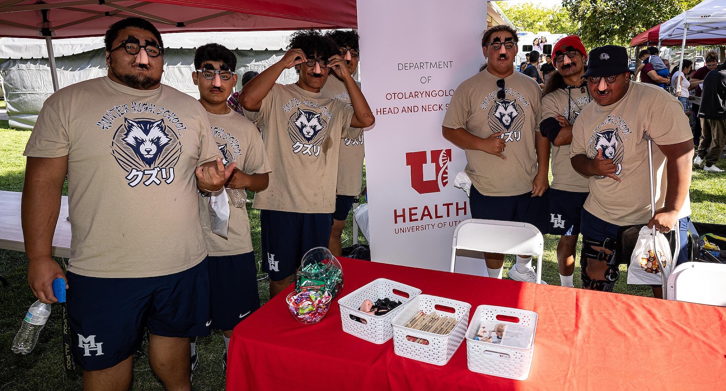 At Healthy Start West Valley, members of the Hunter High School football team partnered with U of U Health to draw attention to the Department of Otolaryngology Head & Neck Surgery booth where U of U of U Health providers shared information about ENT conditions and prevention. 