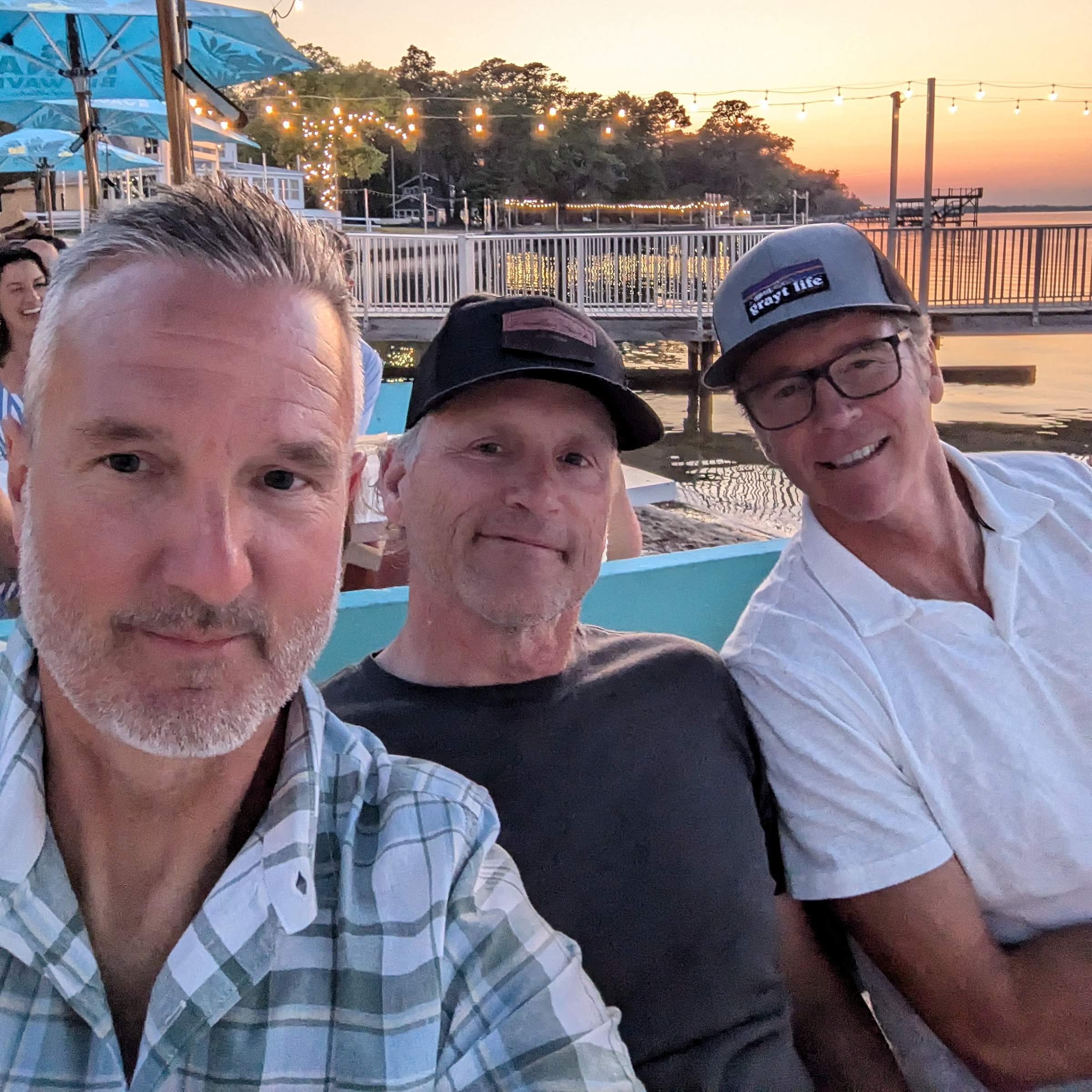 Staying connected with childhood friends at annual get together. From left to right: John Barrett, Charles Morgan, and Dee Davis. 