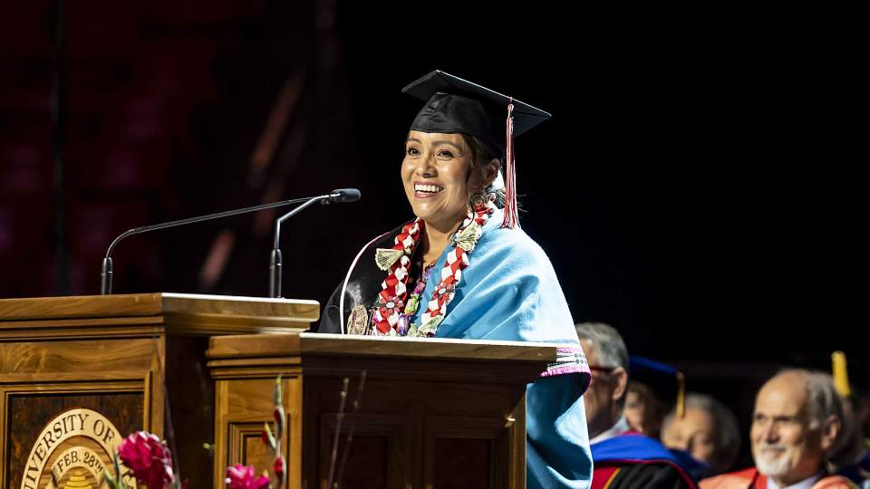 Tracie Yellowman Tséyíníítsó speaks at the 2025 commencement ceremony.