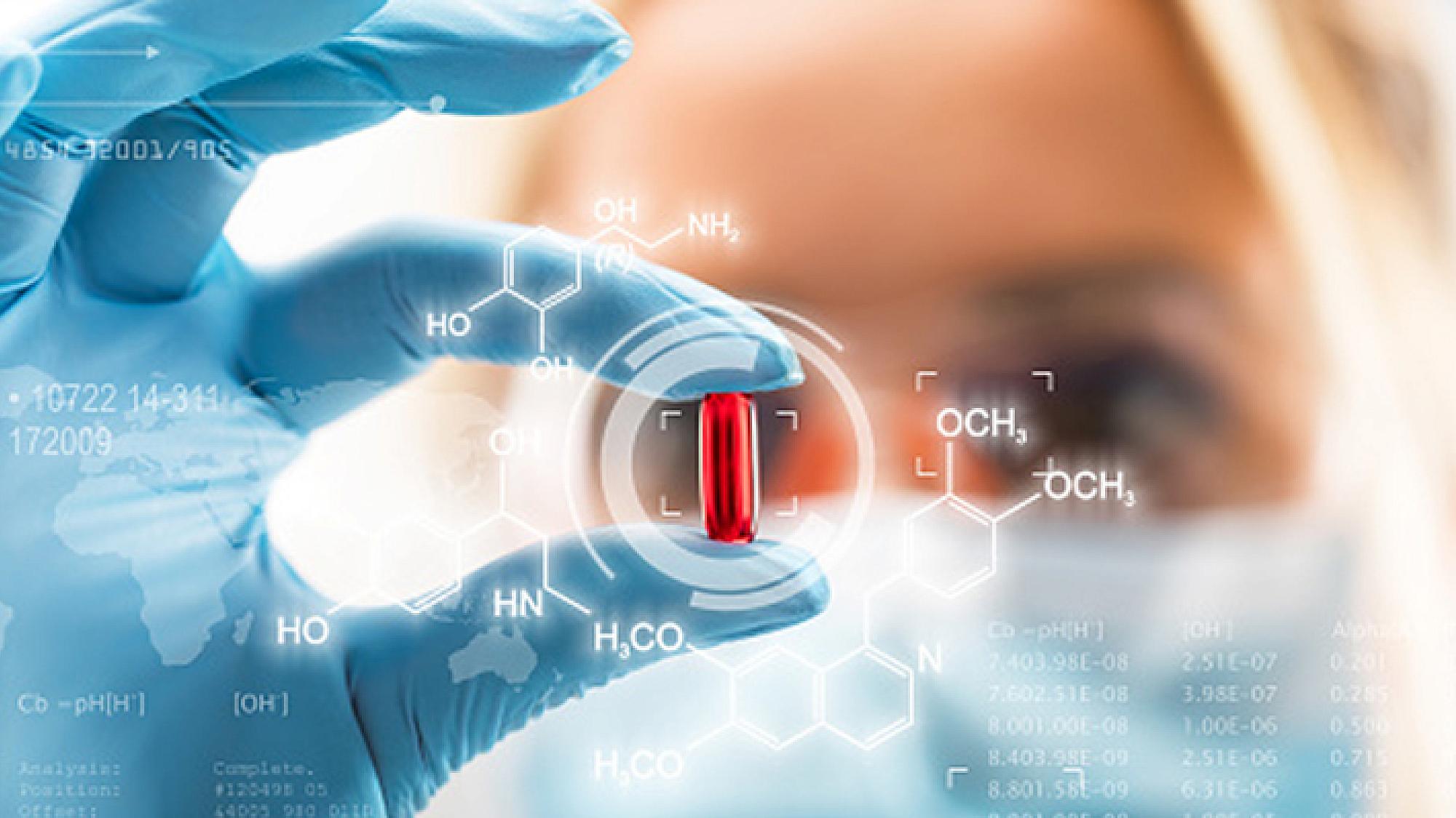 Person with Mask and Glove Examining Pill Chemistry