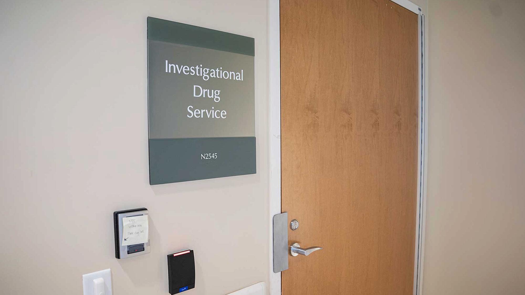Door with plaque reading Investigational Drug Services